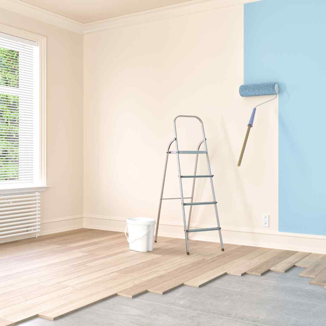 Exterior wall painting in progress (photo 1)